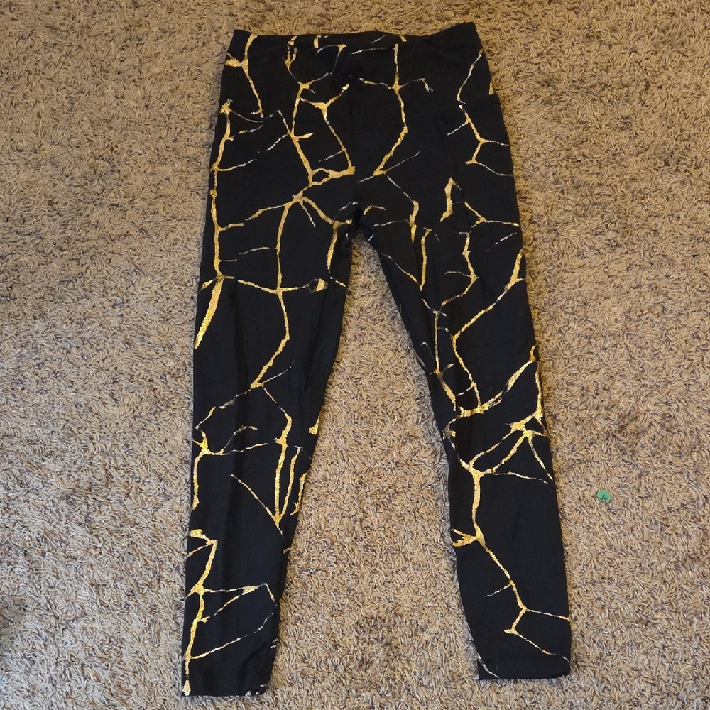 Sweaty Betty Black and Gold Patterned Leggings